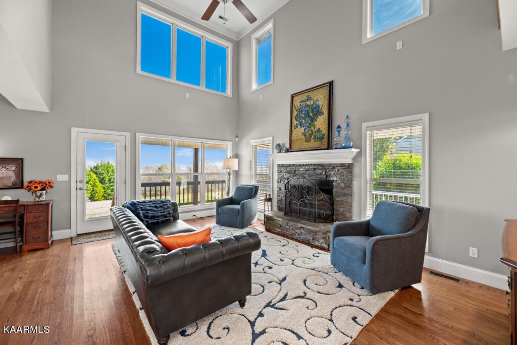 2582 Meadow Road West Greenback, TN 37742 - Photo 7 of 60 a living room with furniture and a fireplace