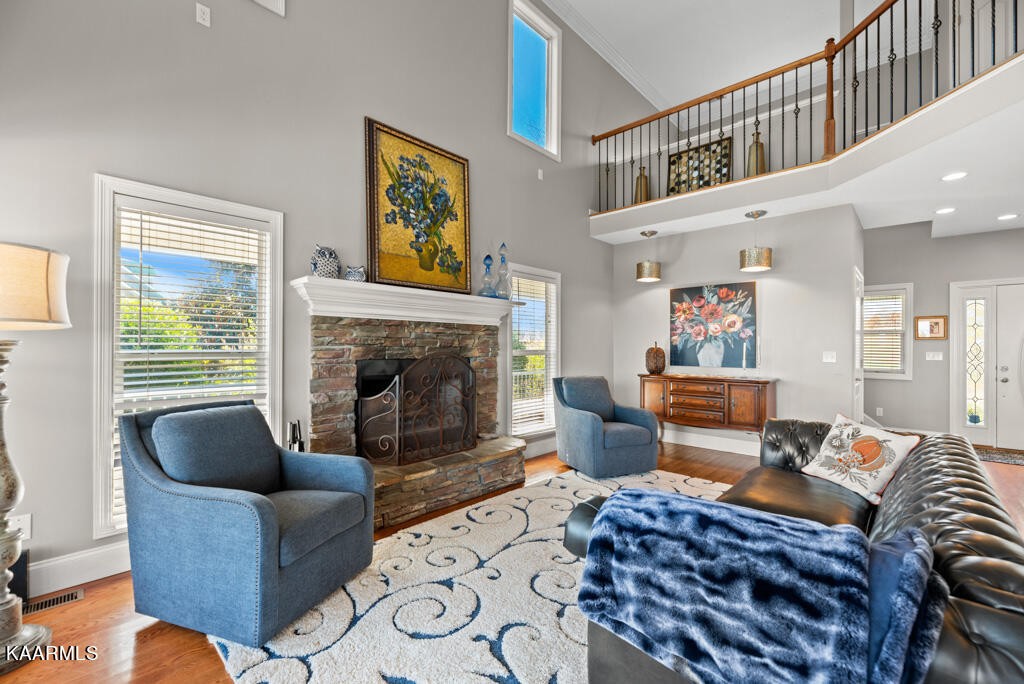 2582 Meadow Road West Greenback, TN 37742 - Photo 8 of 60 a living room with furniture and a fireplace