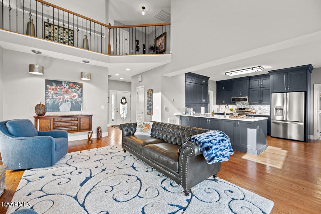 2582 Meadow Road West Greenback, TN 37742 - Photo 9 of 60 a living room with furniture and kitchen view