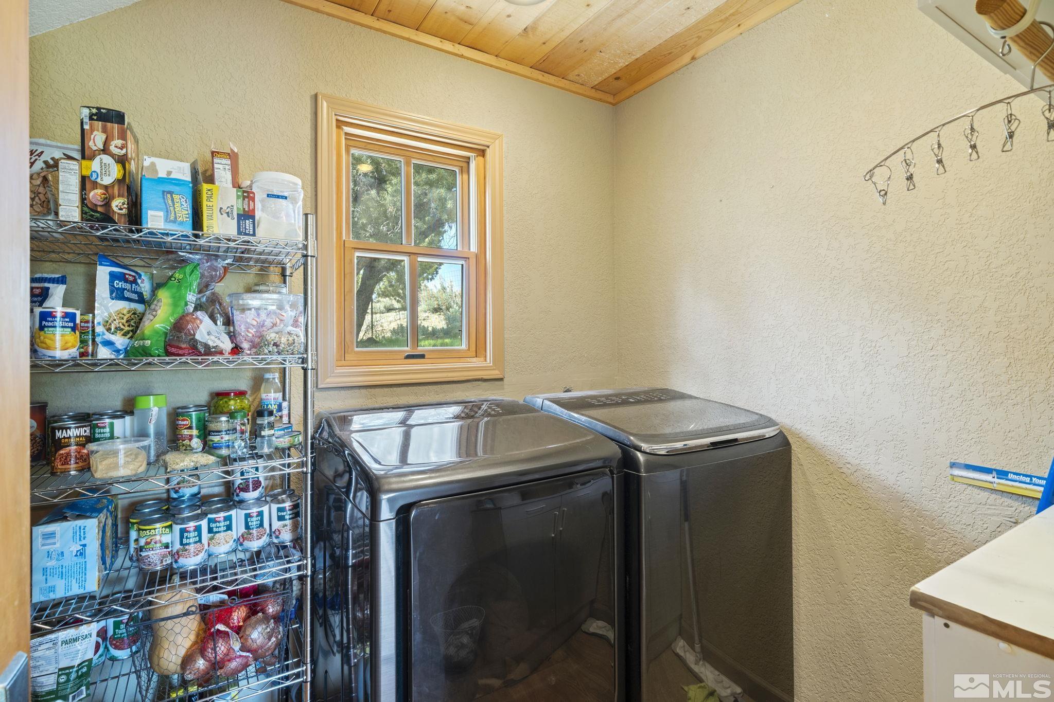 21410 Sazarac Road Reno, NV 89521 - Photo 23 of 38 a utility room with dryer and washer