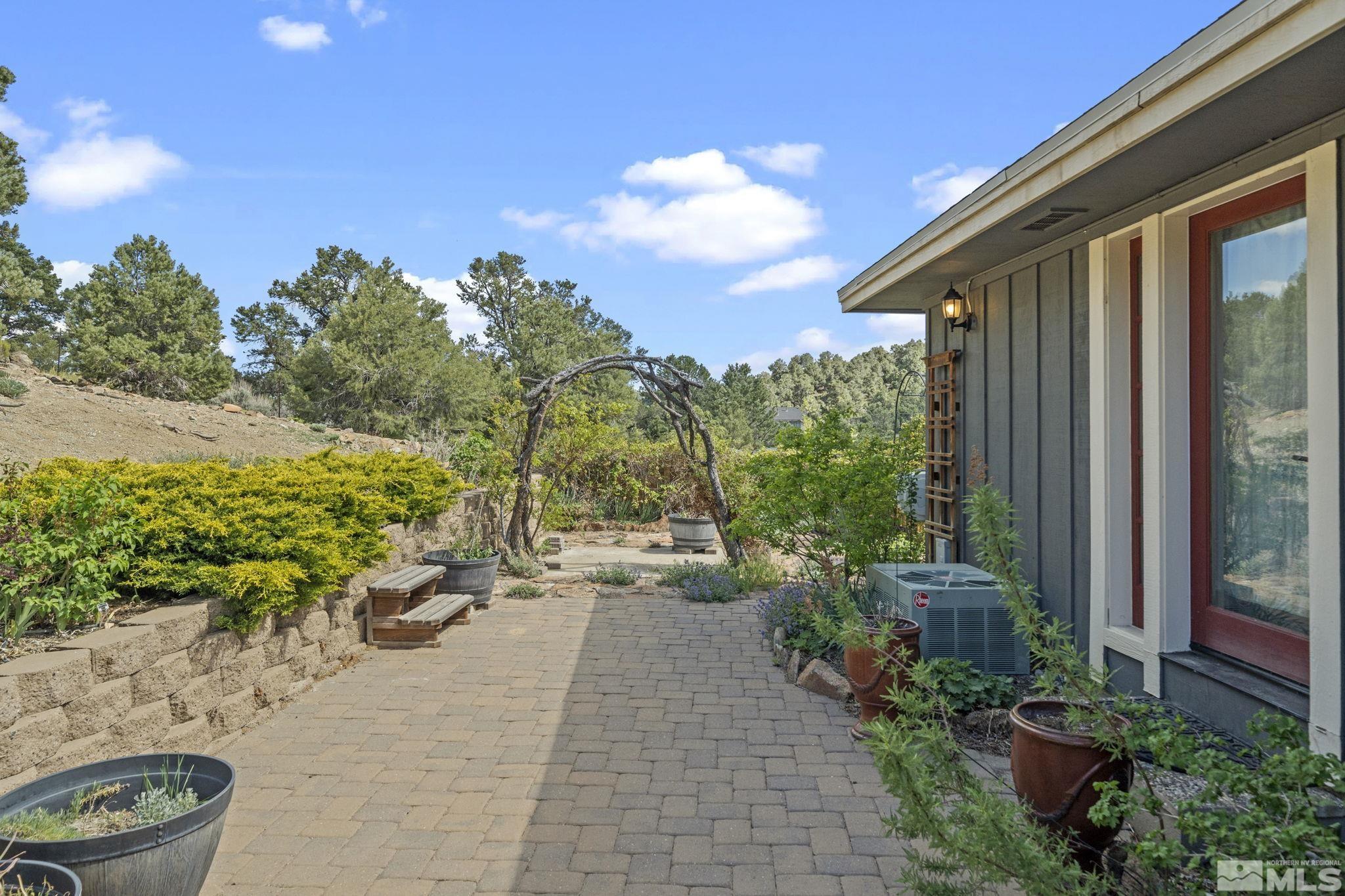 21410 Sazarac Road Reno, NV 89521 - Photo 25 of 38 a view of a backyard with sitting area