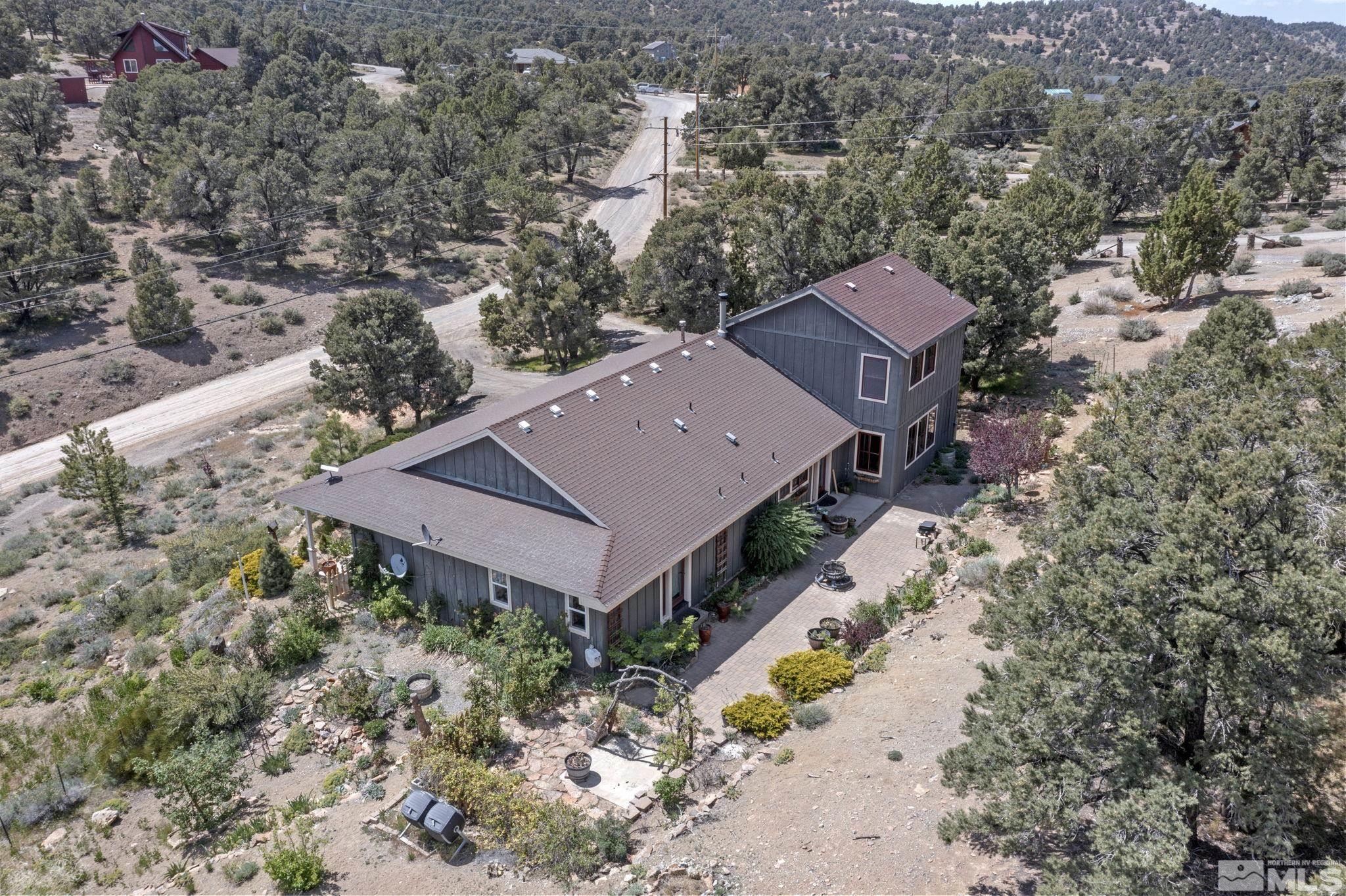 21410 Sazarac Road Reno, NV 89521 - Photo 33 of 38 an aerial view of a house with a yard