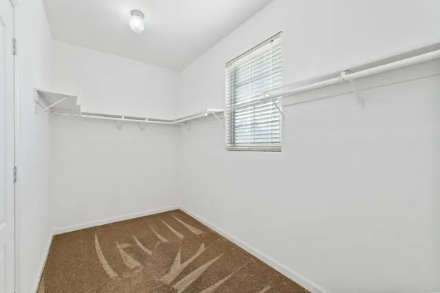 a view of small space with racks on the wall