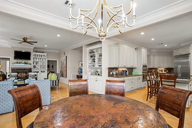 a living room with fireplace furniture and a flat screen tv