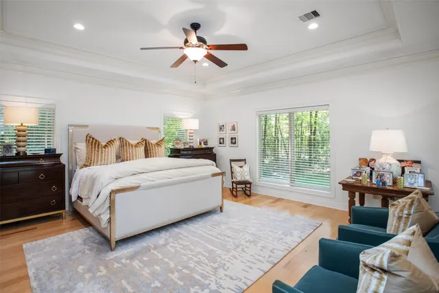 a bed room with a bed and a couch