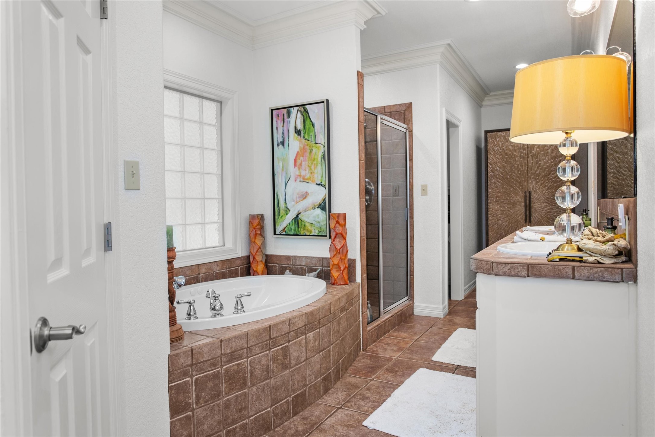 149 Redbud Circle Crockett, TX 75835 - Photo 20 of 43 a bathroom with a tub sink and mirror