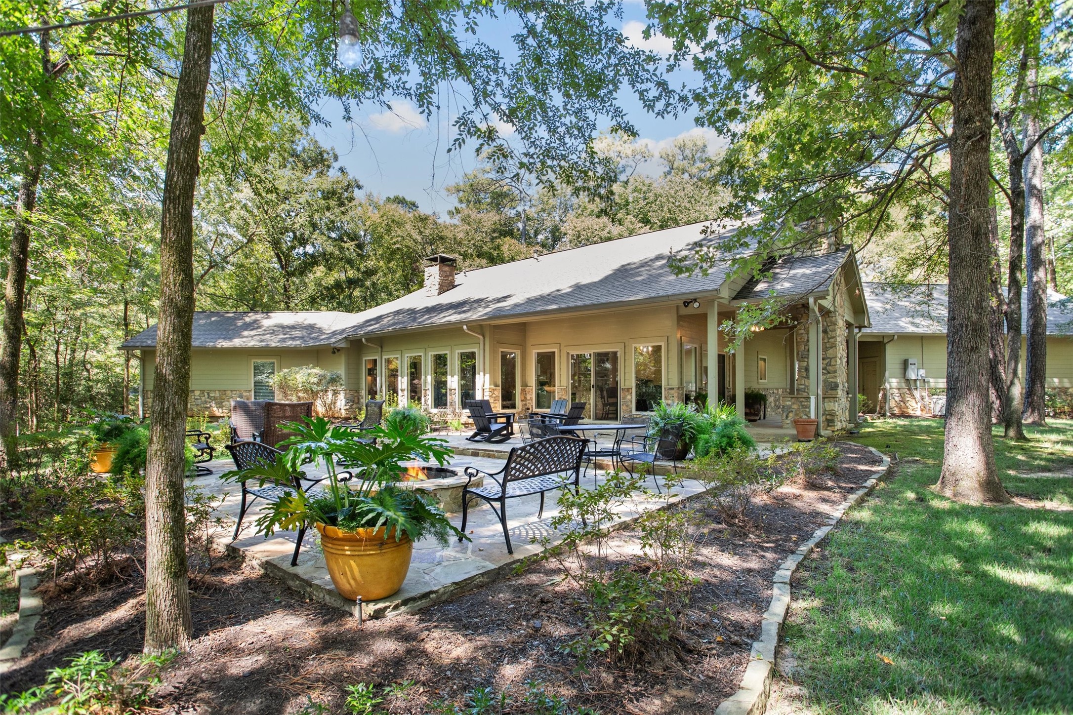 149 Redbud Circle Crockett, TX 75835 - Photo 36 of 43 a view of a house with garden and sitting area