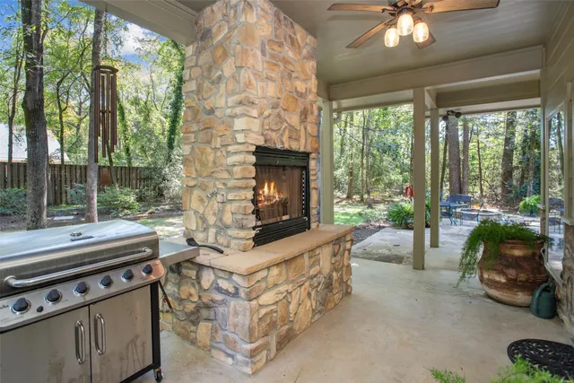 a view of a patio with chairs and tables in the patio