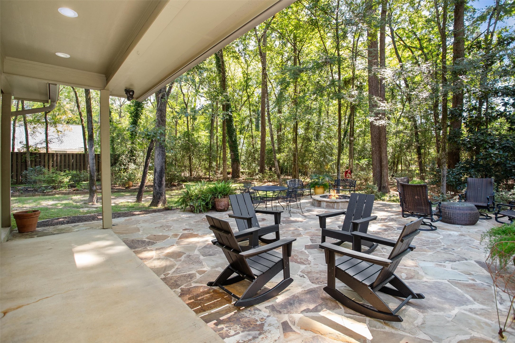 149 Redbud Circle Crockett, TX 75835 - Photo 38 of 43 a view of a patio with chairs and tables in the patio