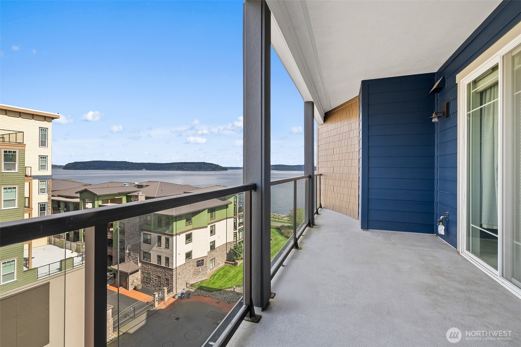 4961 Main Street, Unit 710 Tacoma, WA 98407 - Photo 3 of 24 a view of a balcony with an outdoor space