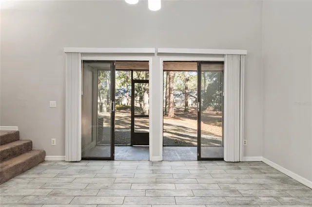 an empty room with windows