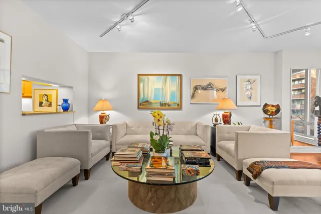 a living room with furniture and window