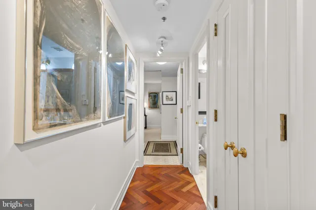 a view of a bathroom with a tub and shower