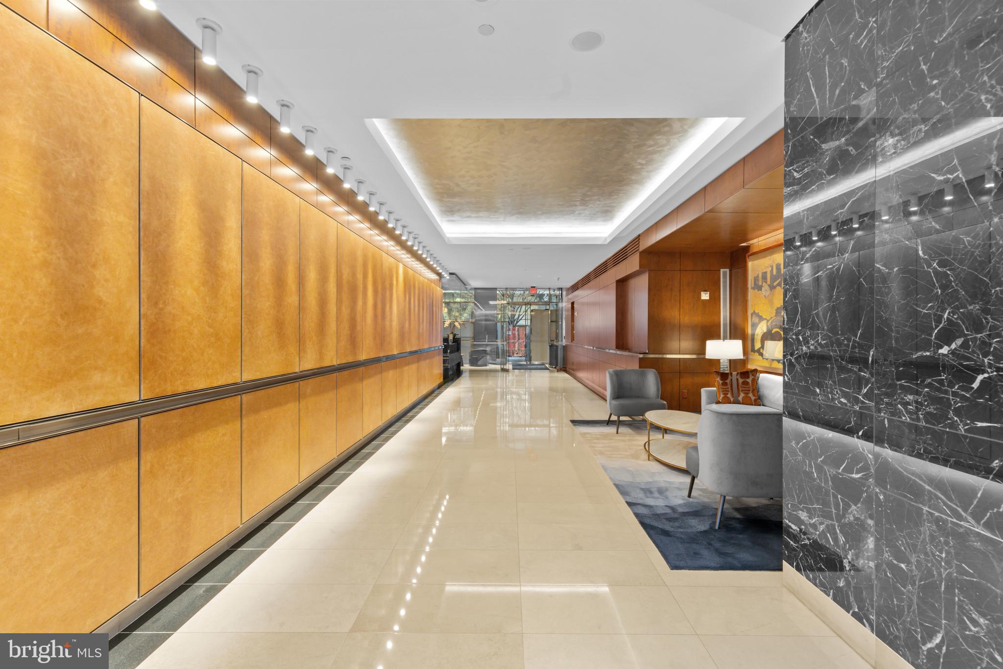 1111 23rd Street Northwest, Unit 4G Washington, DC 20037 - Photo 4 of 35 a view of a patio with table and chairs