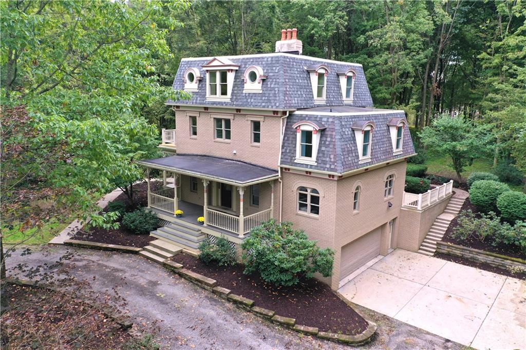 156 West Cruikshank Road Butler, PA 16002 - Photo 2 of 25 a view of a house with a yard plants and large tree
