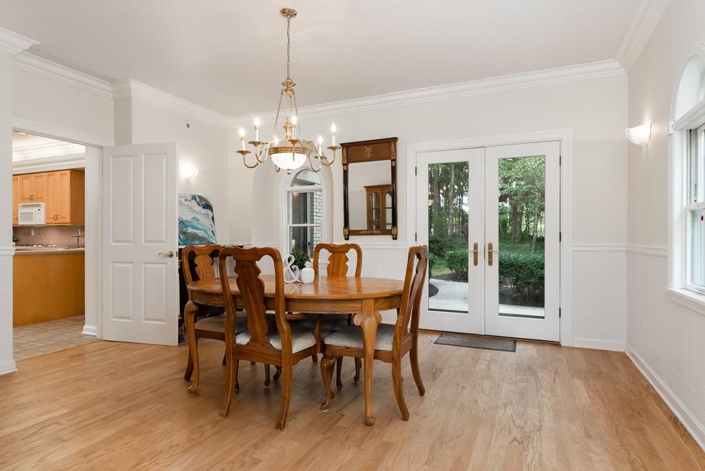 156 West Cruikshank Road Butler, PA 16002 - Photo 9 of 25 a view of a dining room with furniture window and wooden floor