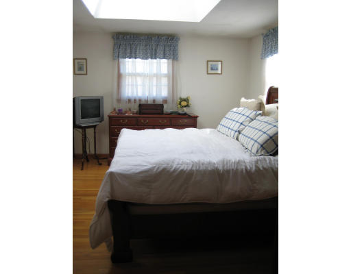 5 Freeman Road Chelmsford, MA 01824 - Photo 11 of 21 a bedroom with a bed and a window