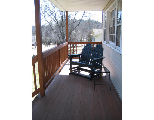 5 Freeman Road Chelmsford, MA 01824 - Photo 21 of 21 a view of balcony with wooden floor and outdoor seating