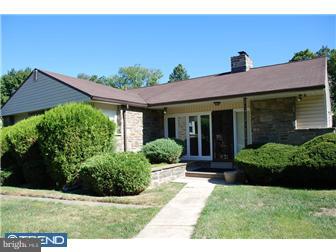 1411 Clements Road Wyncote, PA 19095 - Photo 1 of 12 a view of a house with yard and plants