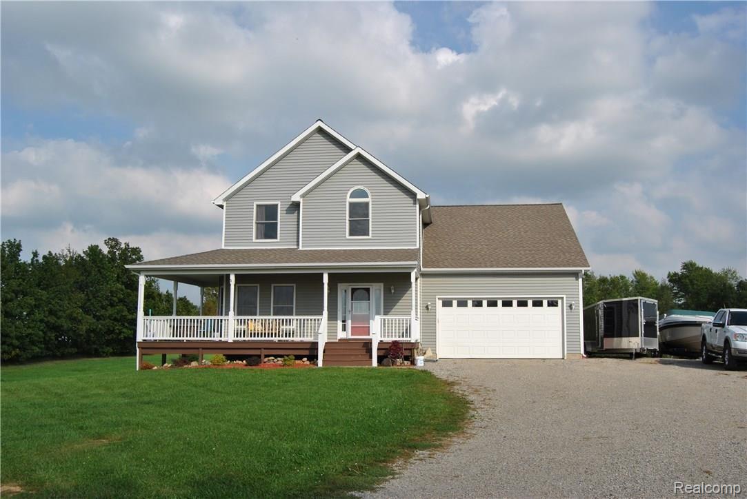 5620 Slattery Road North Branch, MI 48461 - Photo 1 of 16 Front with large wrap around porch