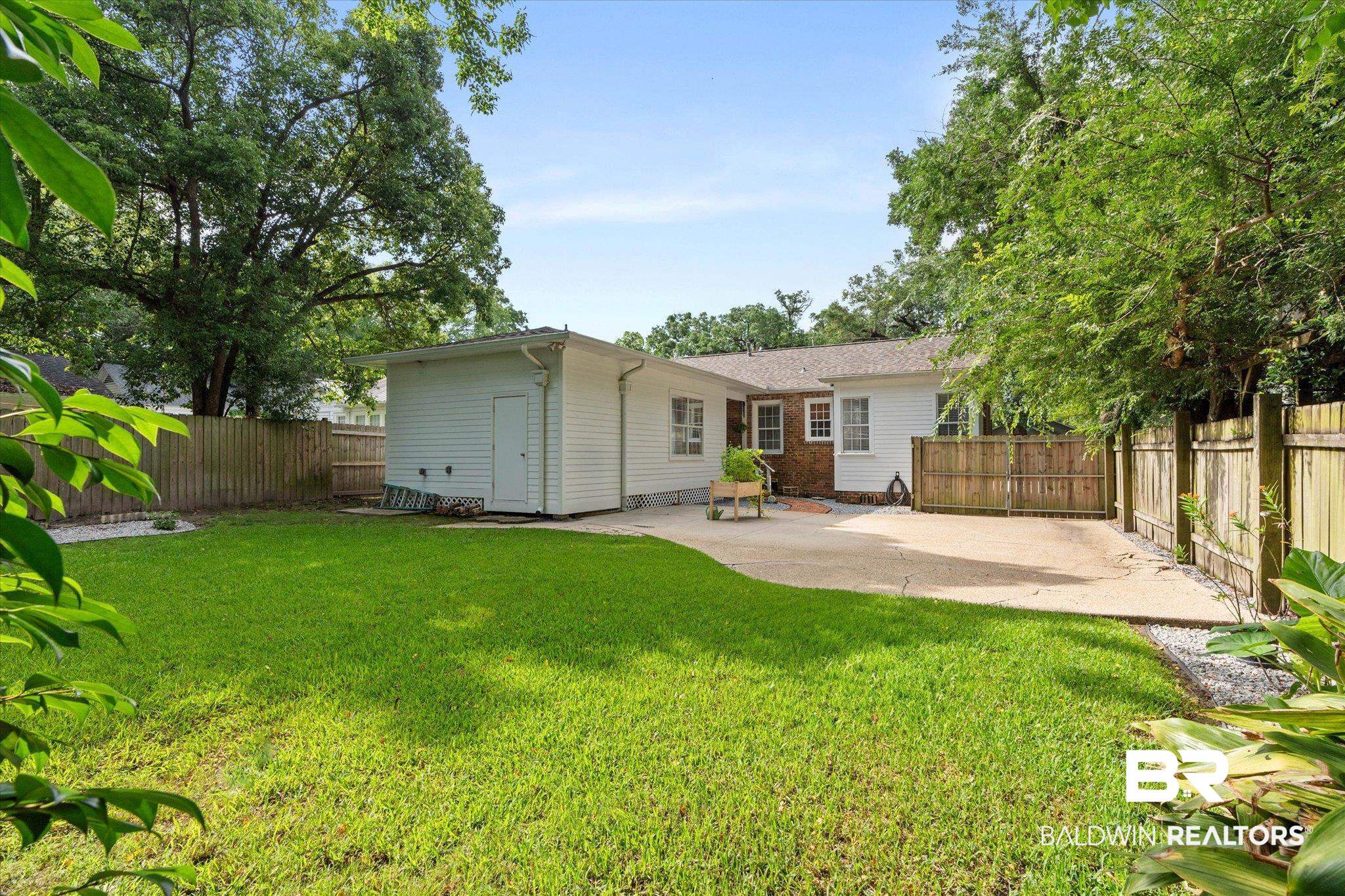 1910 Hunter Avenue Mobile, AL 36606 - Photo 19 of 21 Rear view of property featuring a patio area