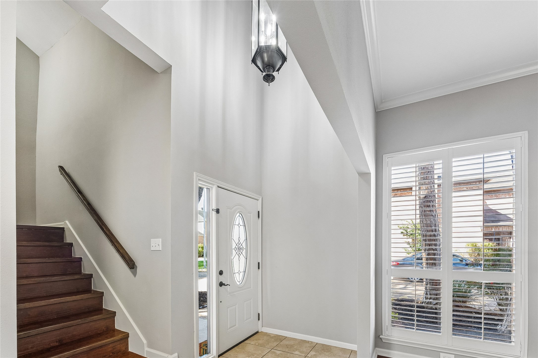 15066 Kimberley Court Houston, TX 77079 - Photo 14 of 27 The entrance has soaring ceilings. The stairway is tucked off the foyer and the formal dining room is on the opposite side.