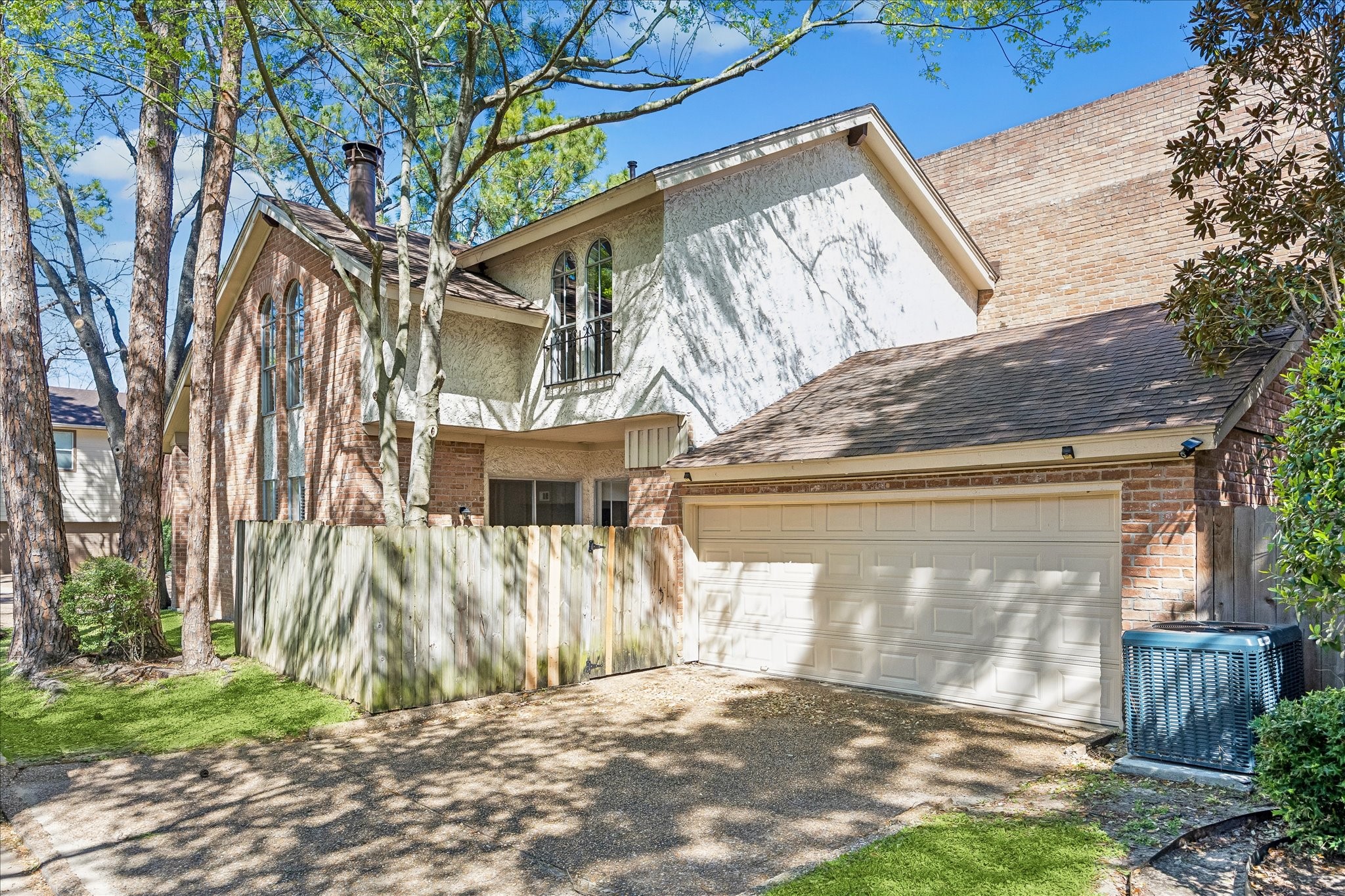 15066 Kimberley Court Houston, TX 77079 - Photo 26 of 27 The attached two-car garage provides secure parking and seamless entry.