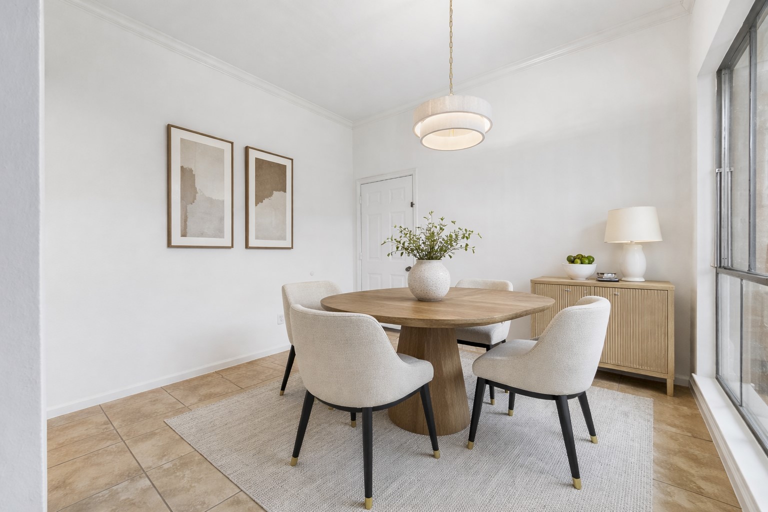 15066 Kimberley Court Houston, TX 77079 - Photo 9 of 27 Well-lit breakfast area welcomes you from the two-car garage and seamlessly flows into the main living spaces. *This photo has been virtually staged.