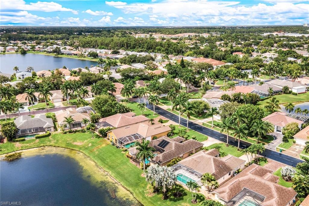914 Marble Drive Naples, FL 34104 - Photo 35 of 50 an aerial view of residential houses with outdoor space