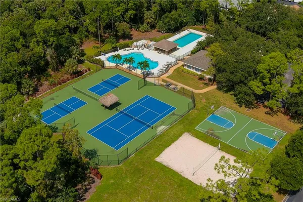 an aerial view of a pool yard patio and outdoor seating