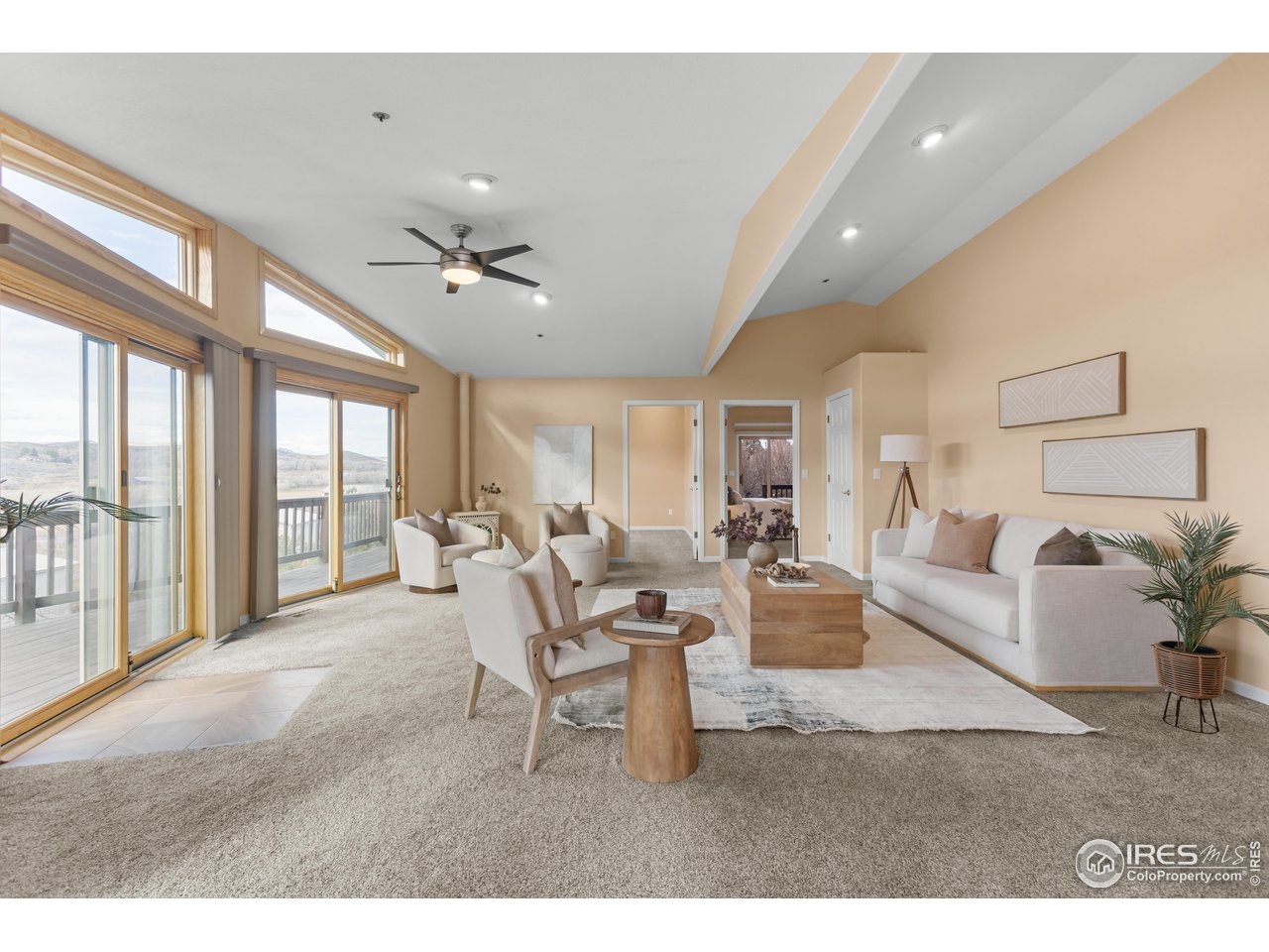 3308 Innisfree Lane Laporte, CO 80535 - Photo 23 of 50 a living room with furniture and large windows