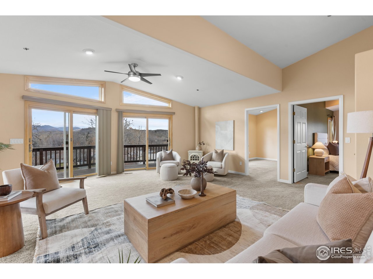 3308 Innisfree Lane Laporte, CO 80535 - Photo 28 of 50 a living room with furniture and large windows
