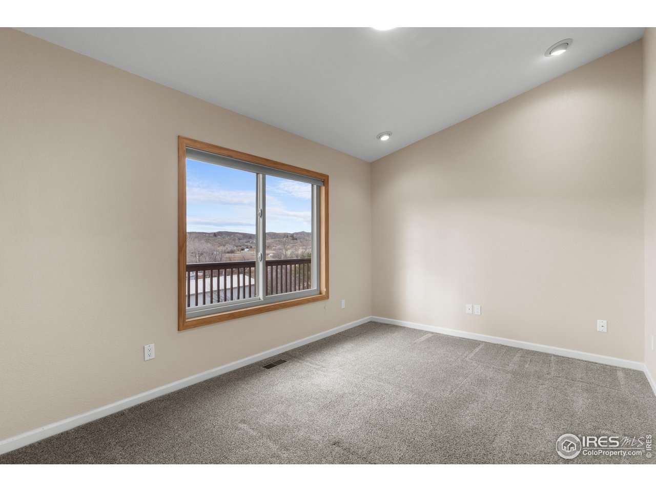 3308 Innisfree Lane Laporte, CO 80535 - Photo 30 of 50 a view of an empty room with a window