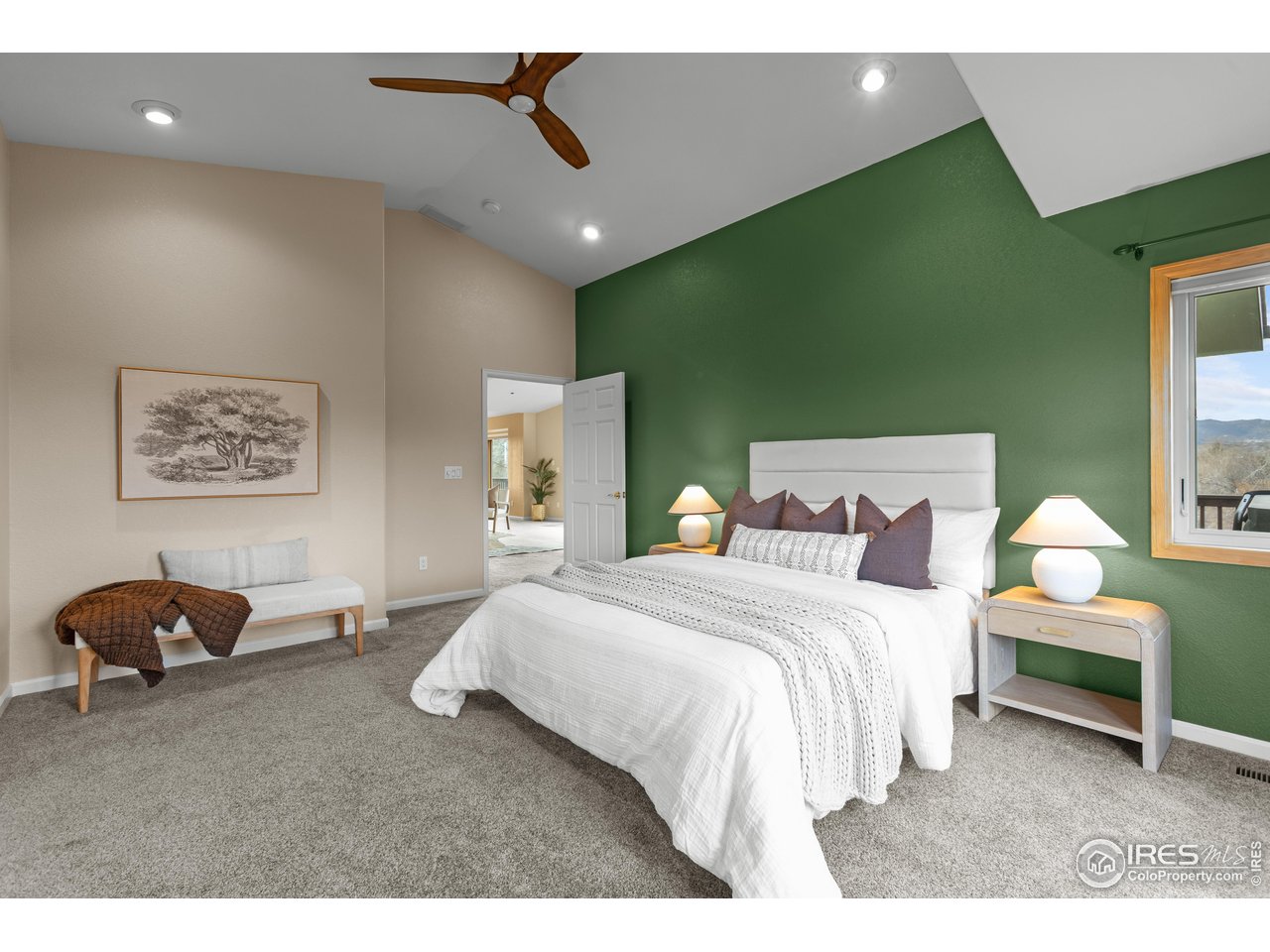3308 Innisfree Lane Laporte, CO 80535 - Photo 32 of 50 a bedroom with a bed and a chandelier