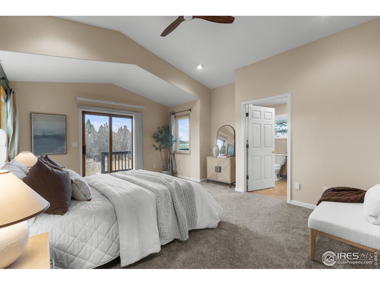 3308 Innisfree Lane Laporte, CO 80535 - Photo 33 of 50 a bedroom with a bed and a large window