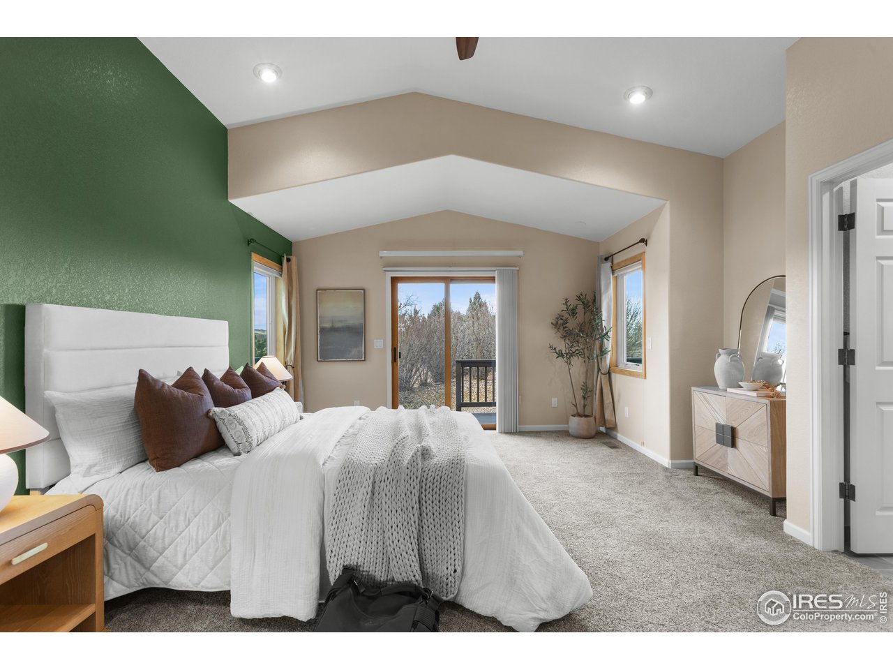 3308 Innisfree Lane Laporte, CO 80535 - Photo 34 of 50 a bedroom with a bed and a large window