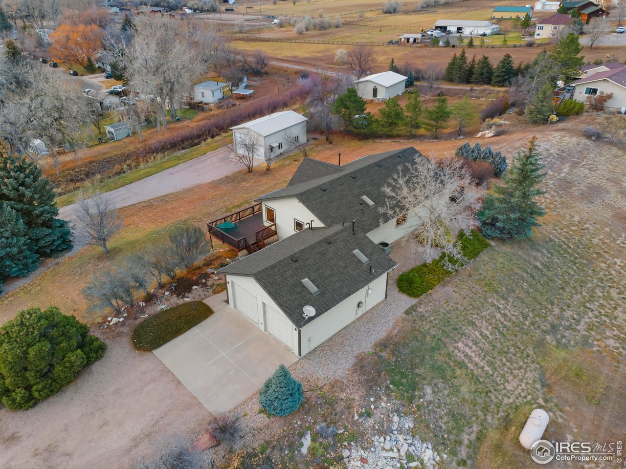 3308 Innisfree Lane Laporte, CO 80535 - Photo 46 of 50 an aerial view of a house with a yard