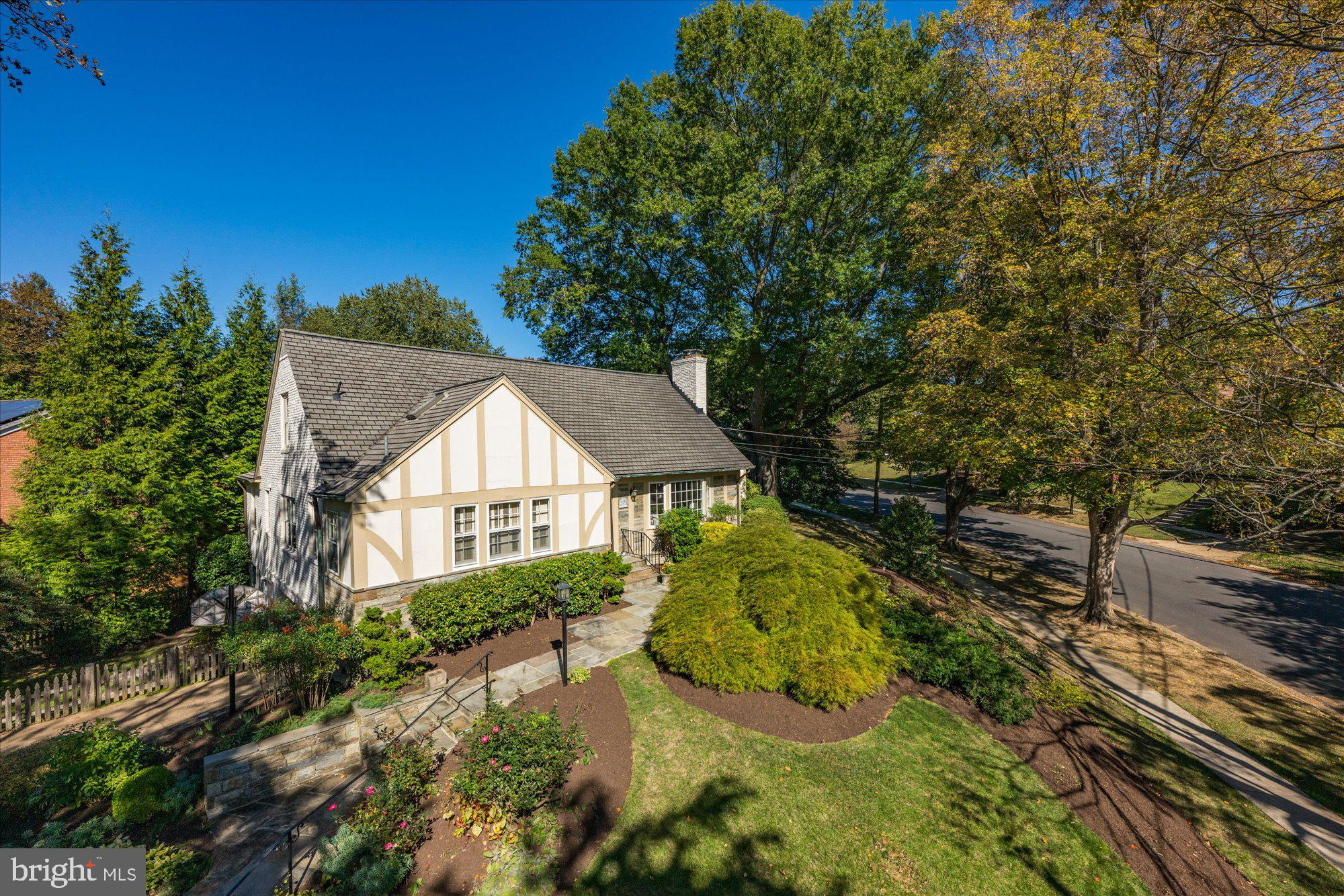 5101 Baltan Road Bethesda, MD 20816 - Photo 54 of 56 a front view of a house with a yard