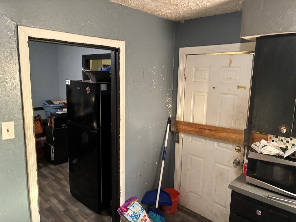 5404 Starling Street Houston, TX 77017 - Photo 7 of 21 a view of hallway with furniture and wooden floor