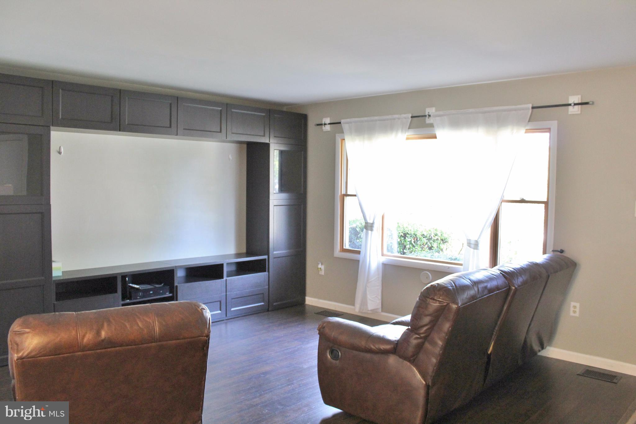 8008 Frye Road Alexandria, VA 22309 - Photo 3 of 30 Living Room w/New Floor and Ample Natural Light!