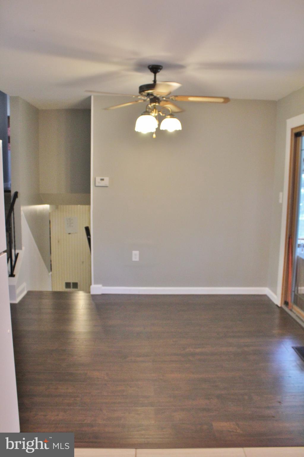 8008 Frye Road Alexandria, VA 22309 - Photo 5 of 30 Bright Dining Room w/New Floors and Ceiling Fan!