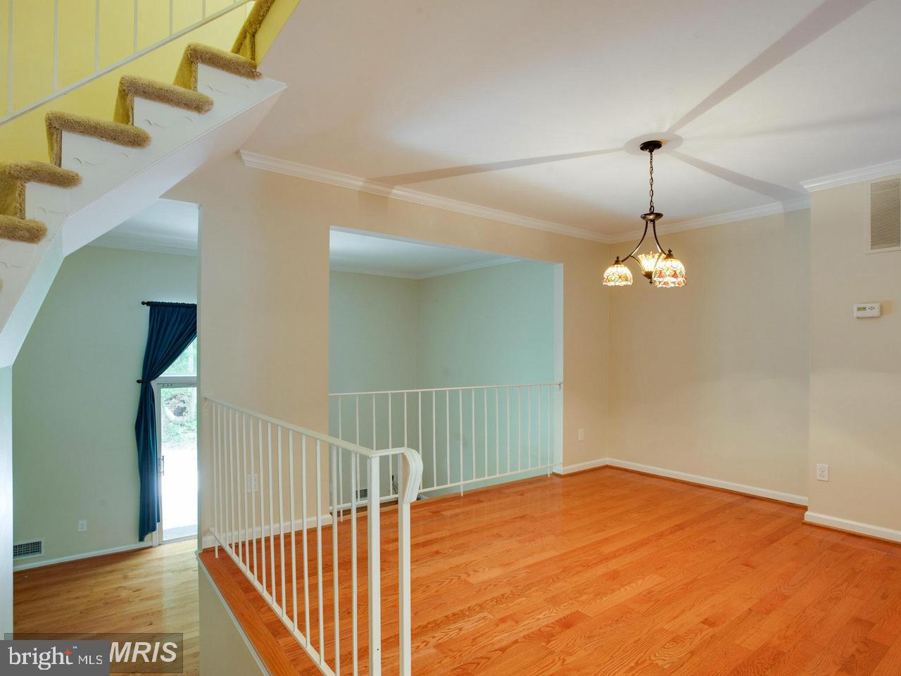 Large dining room overlooking the living room
