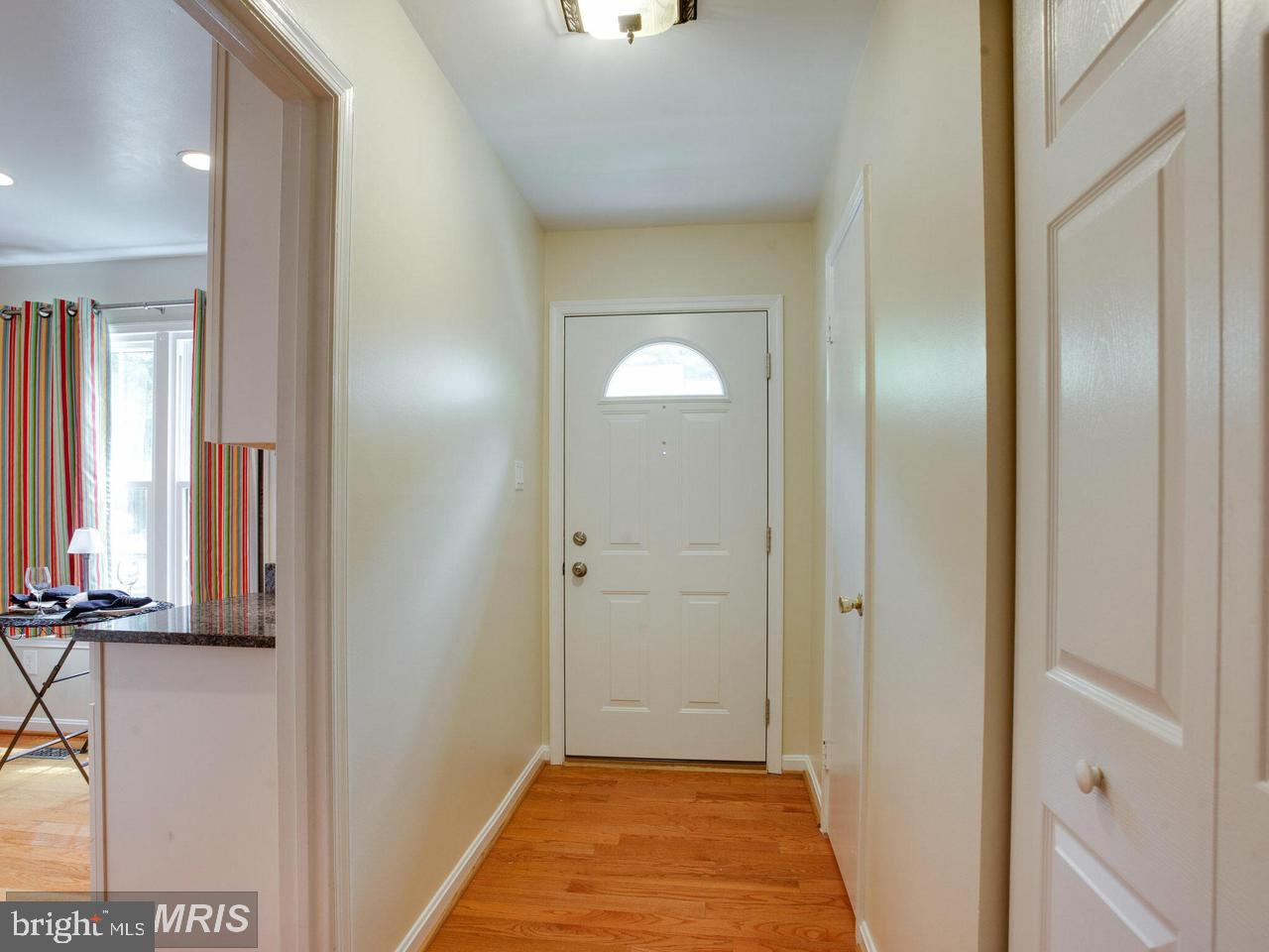 2424 Ansdel Court Reston, VA 20191 - Photo 8 of 25 Foyer with half bath