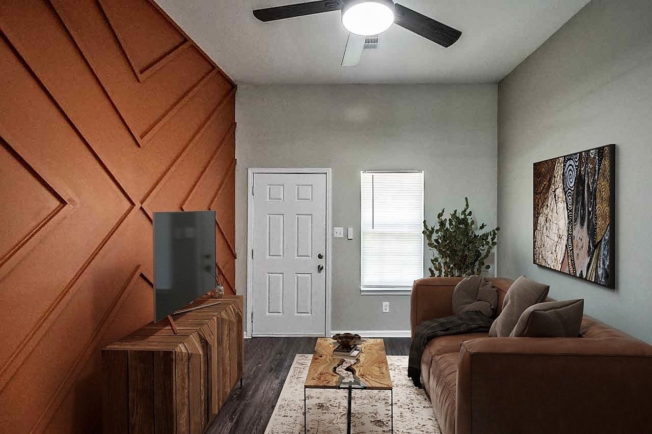 2970 Hoskins Road Memphis, TN 38114 - Photo 3 of 24 16x13 Living Room features Laminate Floor and Decorative Wall. This photo is virtually staged.
