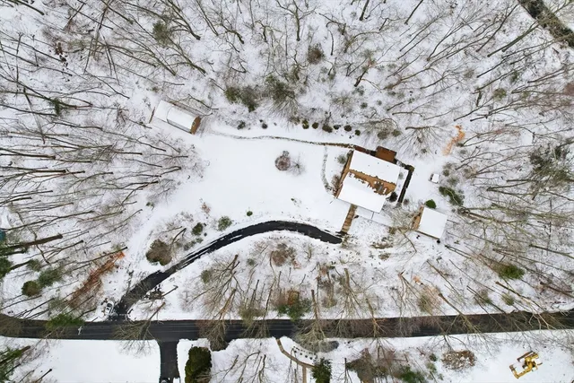 a view of a street with a yard