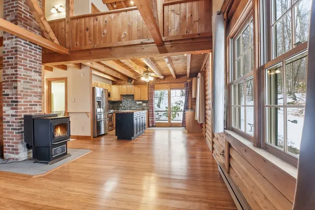a view of a entryway with wooden floor