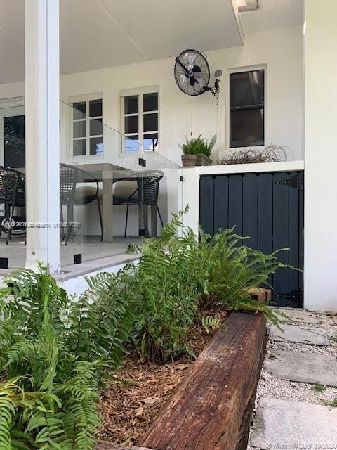 260 Northeast 48th Terrace Miami, FL 33137 - Photo 2 of 14 a garden view with seating space