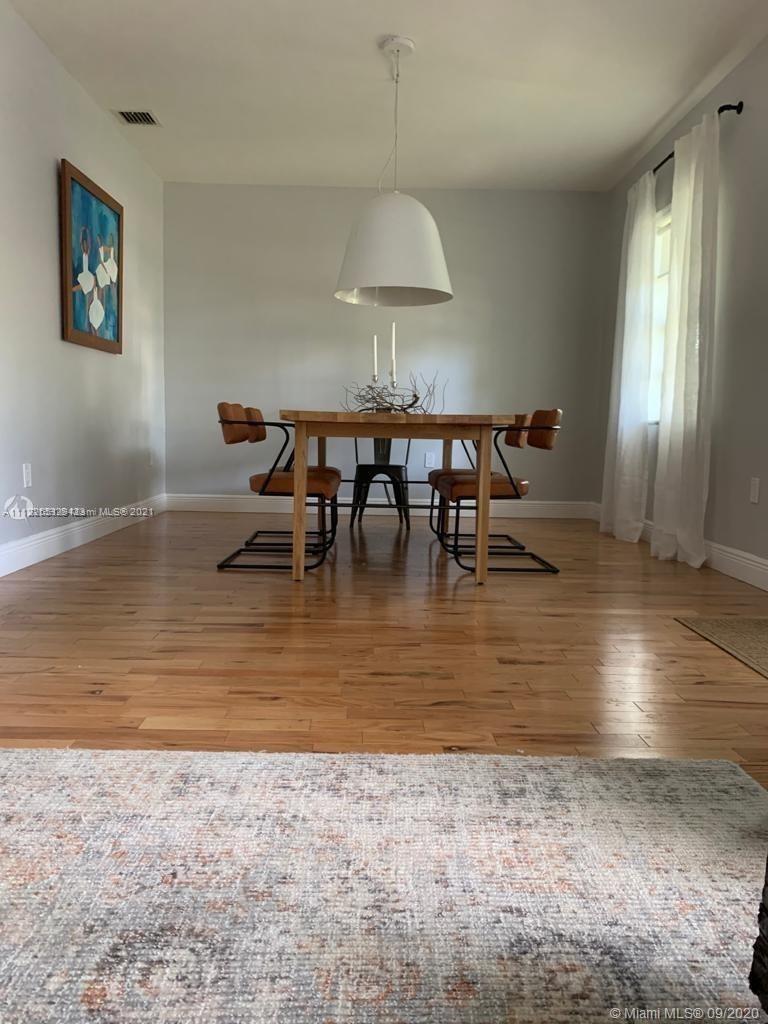 260 Northeast 48th Terrace Miami, FL 33137 - Photo 12 of 14 a view of a dining room with furniture