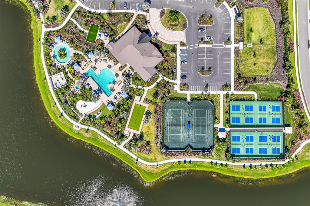 18024 Cropside Trail Lakewood Ranch, FL 34211 - Photo 24 of 42 an aerial view of a house with a swimming pool