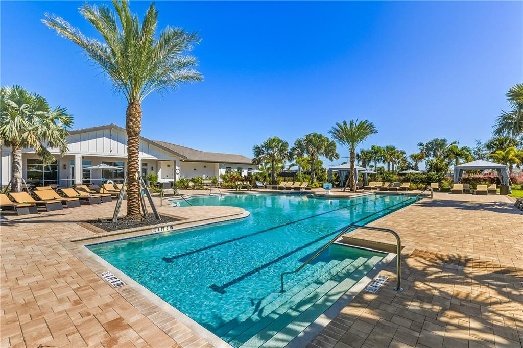 18024 Cropside Trail Lakewood Ranch, FL 34211 - Photo 29 of 42 a view of a swimming pool with a patio